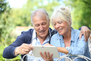 couple looking at a tablet together
