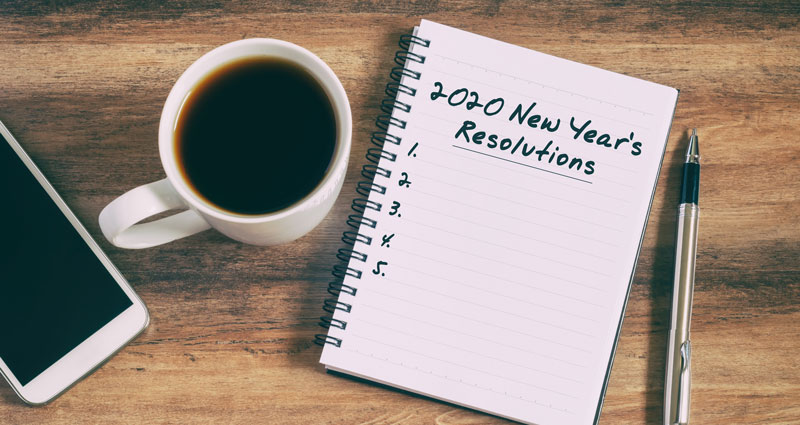 2020 New Year's Resolutions list with coffee cup