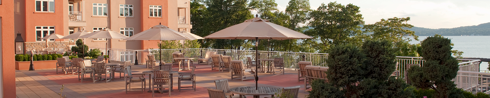 Outdoor terrace with chairs, tables and umbrellas