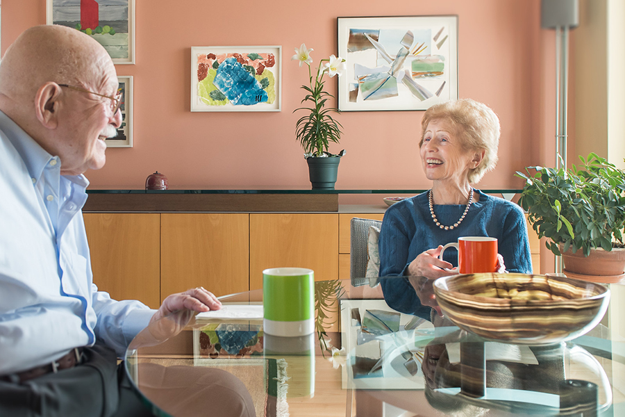 residents smiling over coffee