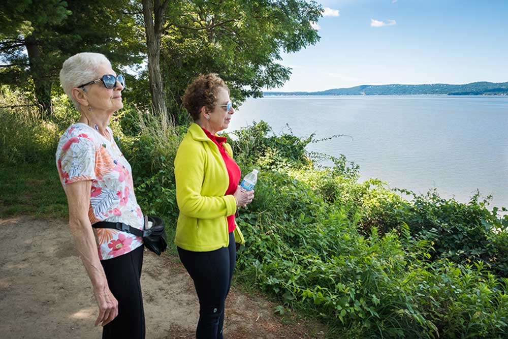 Kendal on Hudson residents taking a walk by the Hudson river