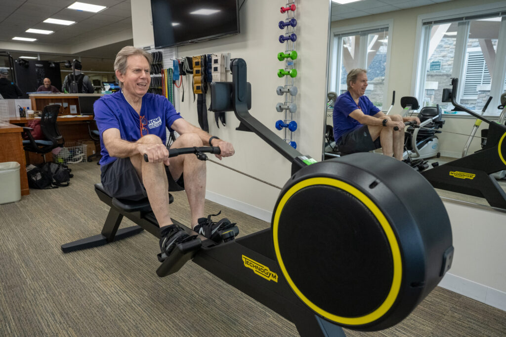 Kendal on Hudson senior using TechnoGym equipment
