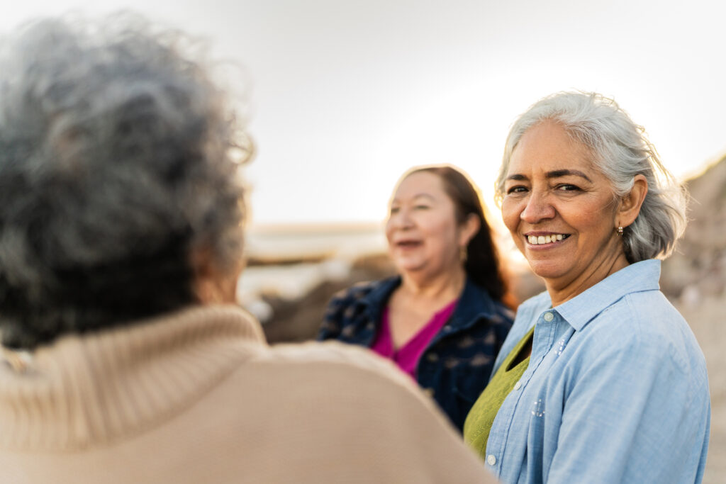 senior women talking and smiling